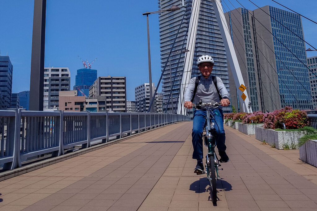Cycle over the bridge on a perfect weather day.